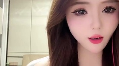 Naughty Japanese babe Ayaka Tomoda masturbates