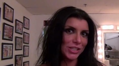 A Black-haired Milf With Enormous Bra-stuffers Gives An