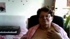 naughty granny flashing her big tits on cam